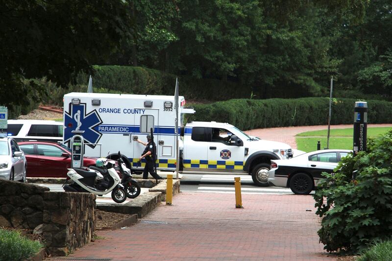 Law enforcement and first responders respond to the University of North Carolina at Chapel Hill campus in Chapel Hill, N.C., on Monday, Aug. 28, 2023, after the university locked down and warned of an armed person on campus