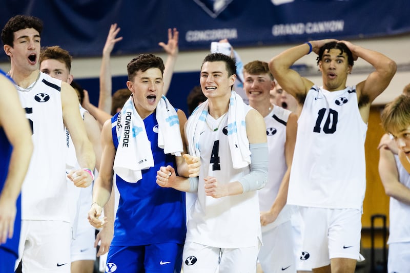 BYU volleyball players celebrate after a point during match against UCSB at the Smith Fieldhouse in Provo.