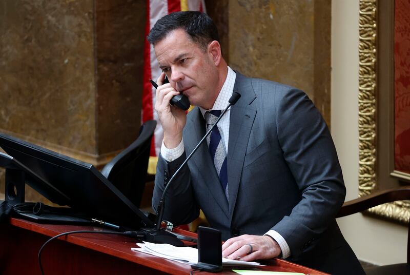 House Speaker Brad Wilson, R-Kaysville, talks on the phone in the House chamber at the Capitol.