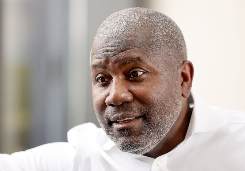 Ian Rowe answers interview questions at the Triad Center in Salt Lake City.