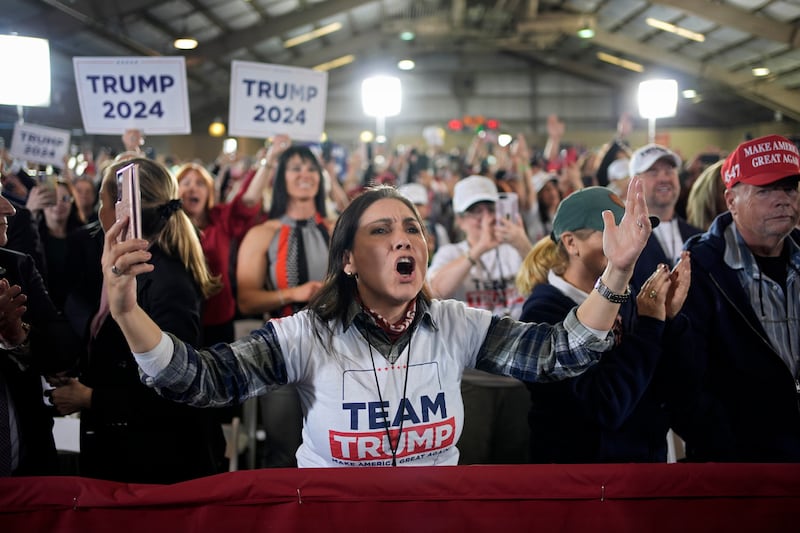 A woman cheers as former President Donald Trump speaks at a campaign event on Jan. 27, 2024, in Las Vegas. Trump continues to be the solid front-runner in the GOP primary polls.