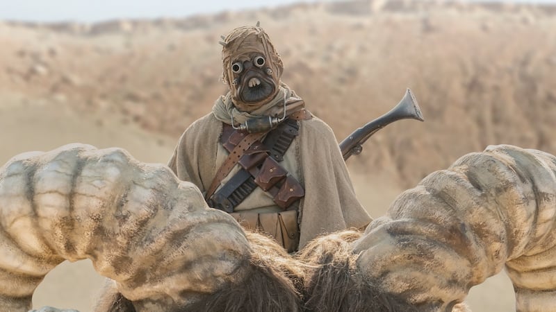Tusken Raider and bantha in “The Mandalorian” season 2.