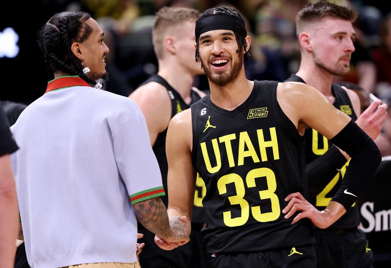 Utah Jazz guard Jordan Clarkson talks with Utah Jazz guard Johnny Juzang