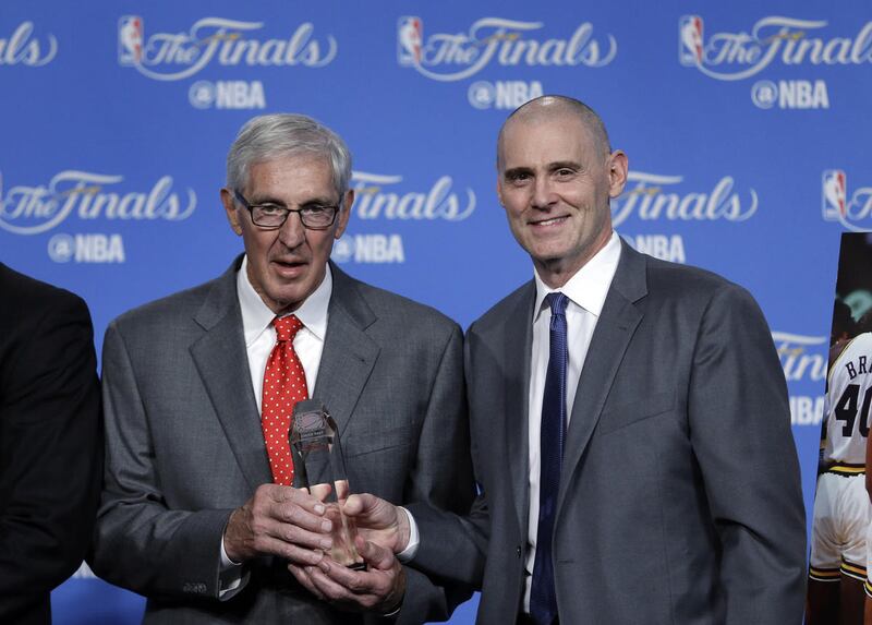 Former NBA coach Jerry Sloan, left, is awarded the NBA Coaches Association 2016 Chuck Daly Lifetime Achievement award by Rick Carlisle, Head Coach of the Dallas Mavericks and President of the National Basketball Coaches Association before Game 3 of basket