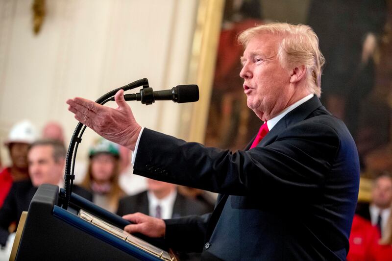 FILE - In this July 19, 2018 file photo, President Donald Trump speaks before signing an Executive Order that establishes a National Council for the American Worker during a ceremony in the East Room of the White House in Washington. Trump said he’s willi