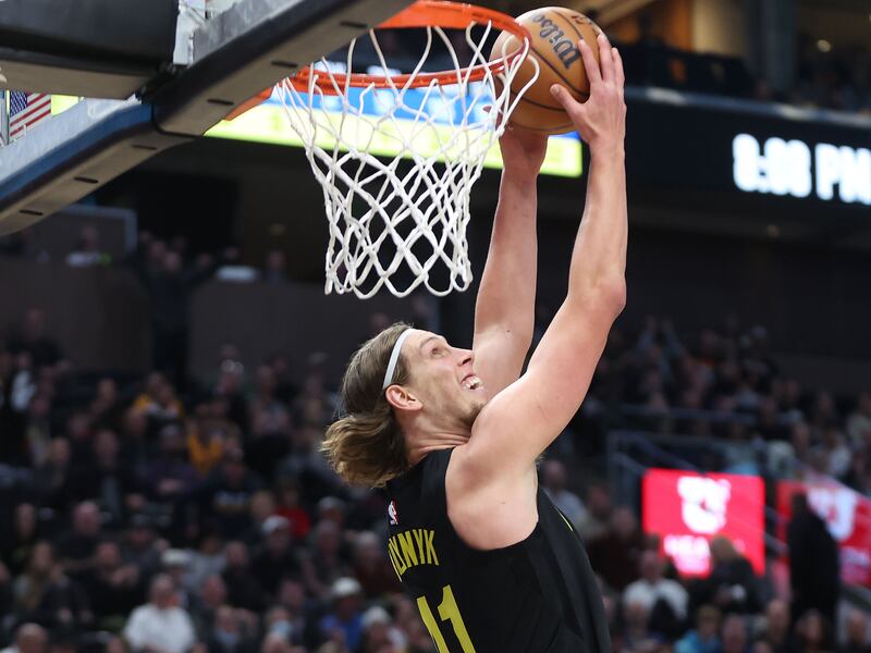 Utah Jazz forward Kelly Olynyk (41) dunks on the New York Knicks in Salt Lake City on Tuesday, Nov. 15, 2022.
