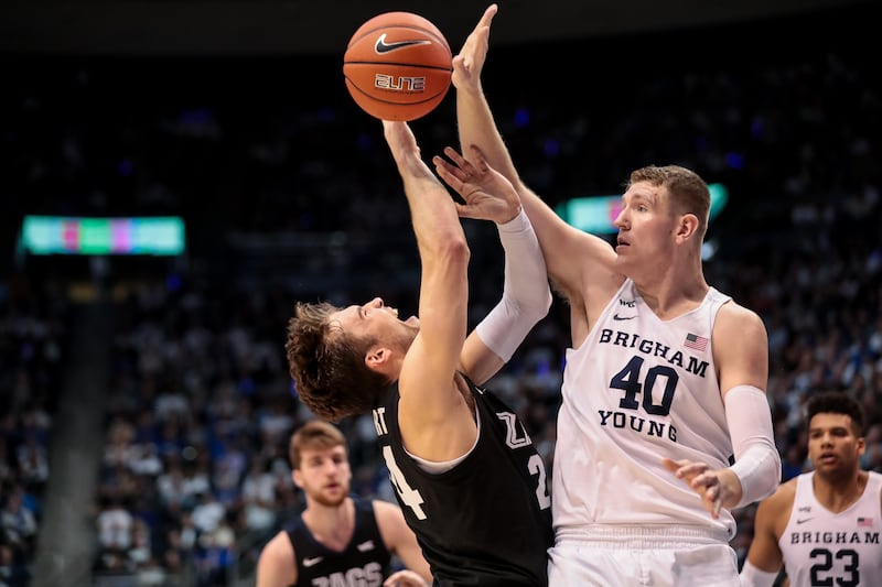 Gonzaga’sCorey Kispert drives against BYU’s Kolby Lee at the Marriott Center in Provo on Saturday, Feb. 22, 2020.