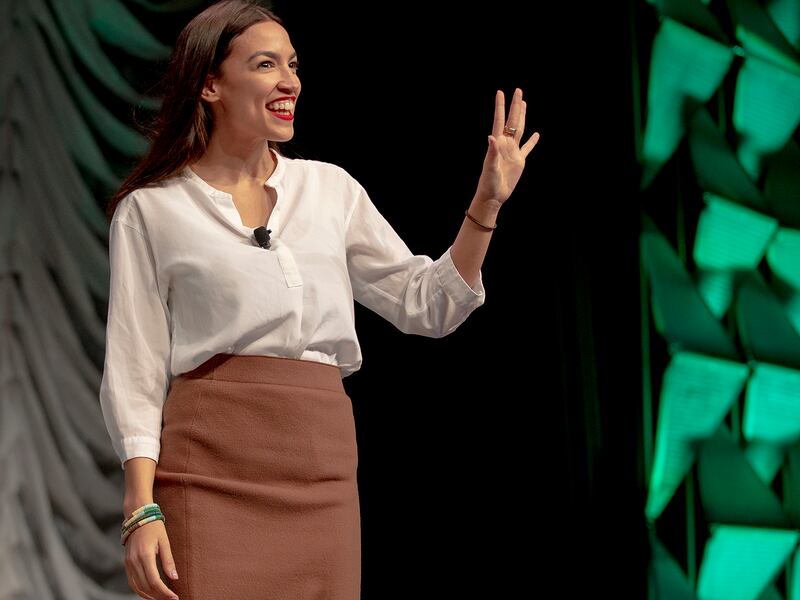 Rep. Alexandria Ocasio-Cortez, D-New York, waves to the audience during South by Southwest on Saturday, March 9, 2019, in Austin, Texas. Texas is an early primary state, but the real draw of the South by Southwest Festival in Austin for Democrats is face