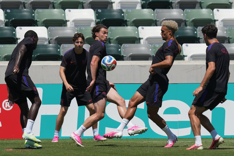 United States' Joe Scally, center, Antonee Robinson, center right, and teammates attend a training session ahead of their FIFA World Cup match against Paraguay at its World Cup soccer tournament training base in Irvine, Calif., Thursday, June 11, 2026.