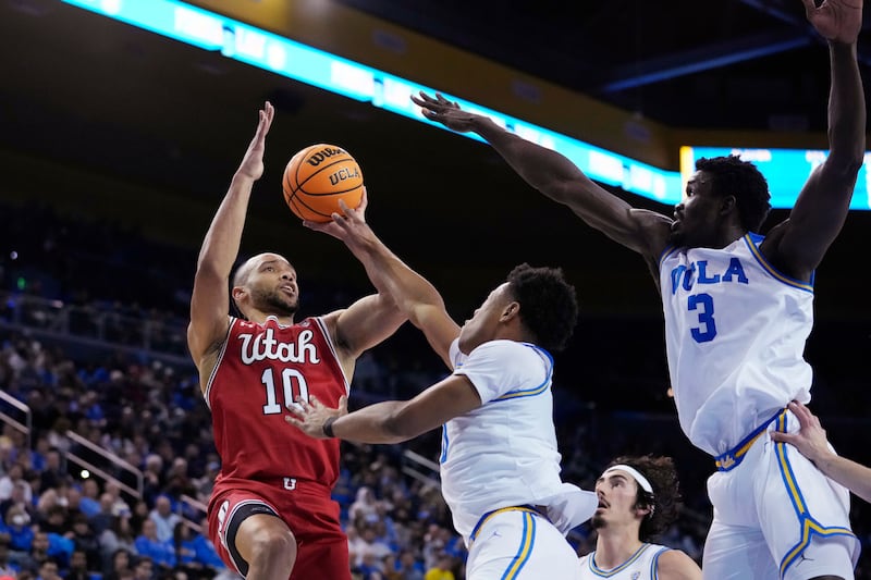 Utah guard Marco Anthony shoots over UCLA guard Jaylen Clark Thursday, Jan. 12, 2023, in Los Angeles.