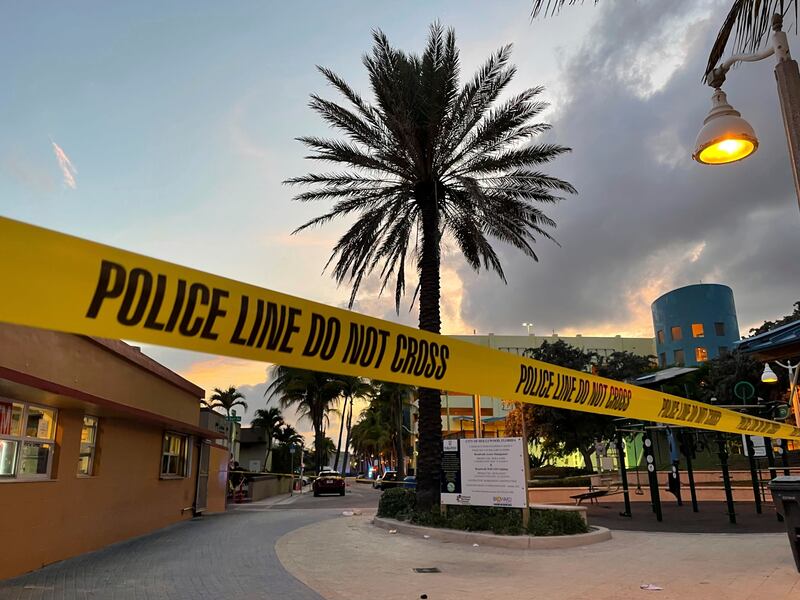 Police cordon off an area as they respond to a shooting near the Hollywood Beach Broadwalk in Hollywood, Fla., May 29, 2023.