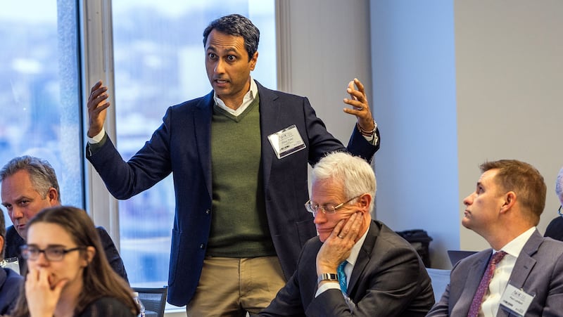 Eboo Patel, president of Interfaith America, poses a question during a forum focusing on the fate of the religious university.
