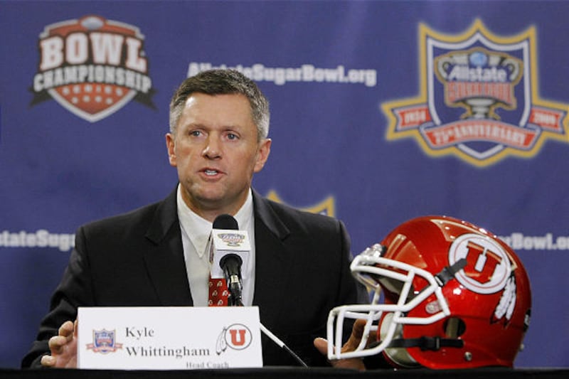 Utah's Kyle Whittingham was named the coach of the year by the American Football Coaches Association for the Utes' 13-0 season.