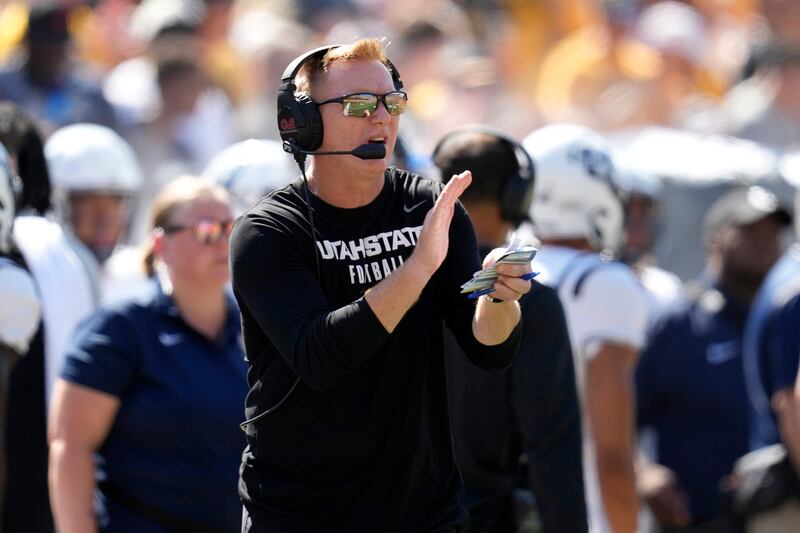 Utah State coach Blake Anderson watches from the sideline during a game against Iowa, Sept. 2, 2023, in Iowa City, Iowa.