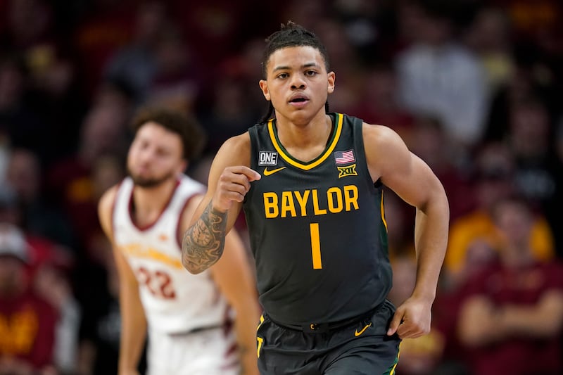 Baylor guard Keyonte George runs up court during the second half of an NCAA college basketball game against Iowa State, Saturday, Dec. 31, 2022, in Ames, Iowa. Iowa State won 77-62. (AP Photo/Charlie Neibergall)