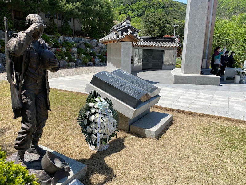 The statue of an American soldier salutes at the Gapyeong Monument in South Korea.