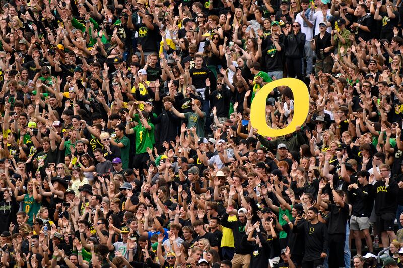 Oregon students and fans cheer during game against BYU Saturday, Sept. 17, 2022, in Eugene, Ore.