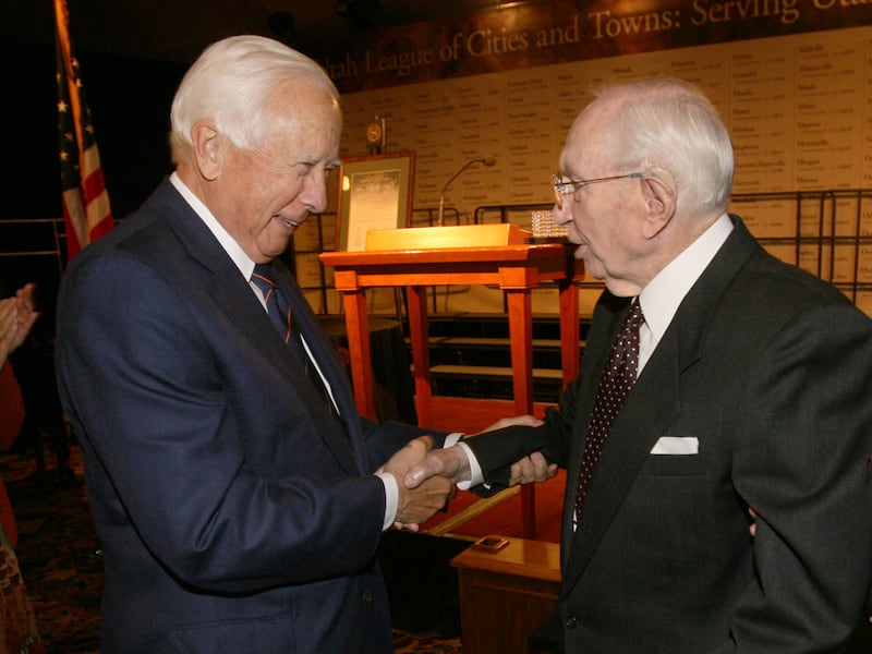 Historian and author David McCullough, left, congratulates President Gordon B. Hinckley after he received an award.