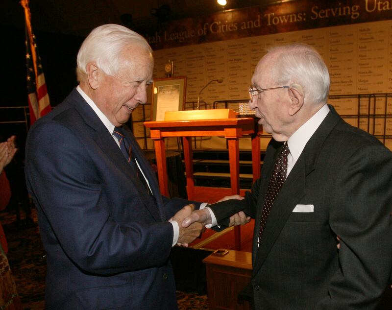Historian and author David McCullough, left, congratulates President Gordon B. Hinckley after he received an award.