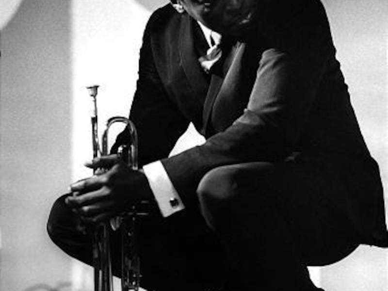 This photo provided by the Monterey Jazz Festival from the book "Monterey Jazz Festival: 40 Legendary Years," shows Miles Davis in 1964 at the Monterey Jazz Festival in Monterey, Calif. The festival celebrates its 50th anniversary this year.