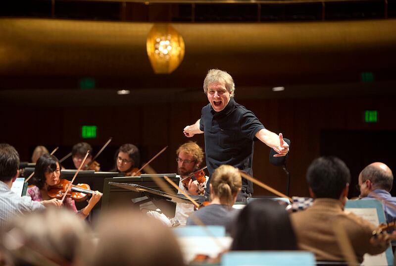 Thierry Fischer, music director of the Utah Symphony Orchestra, conducts a practice at Abravanel Hall in Salt Lake City on Wednesday, Nov. 20, 2013. On Tuesday, the Utah Symphony announced a full return for the 2021-22 season.