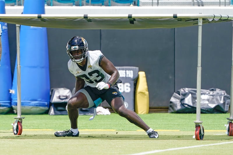 Jacksonville Jaguars inside linebacker Devin Lloyd performs a drill