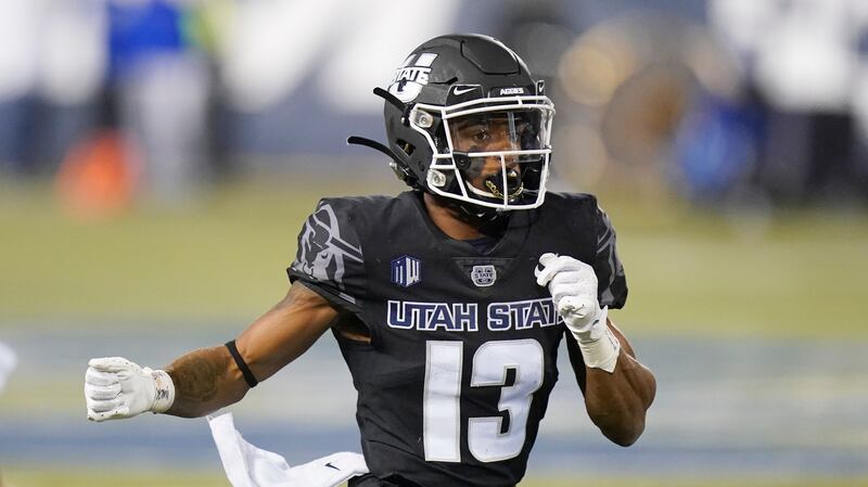 Utah State receiver Deven Thompkins (13) leads the Aggies against Hawaii this weekend.