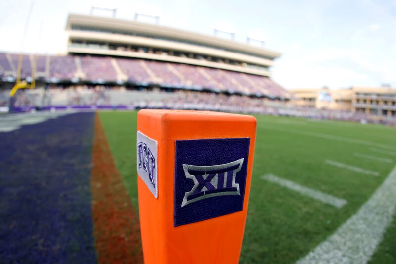 A Big 12 Conference logo is displayed on a goal line pylon before Duquesne played TCU in Fort Worth, Texas.