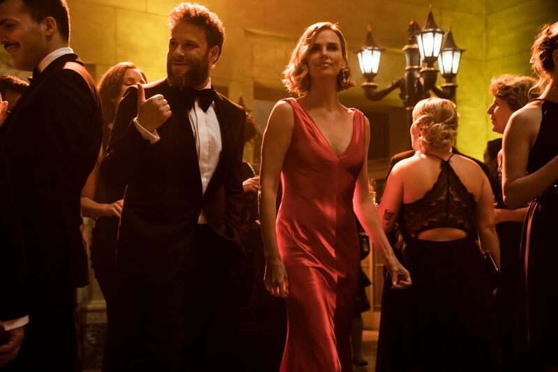 Seth Rogen, left, and Charlize Theron in a scene from the film "Long Shot."