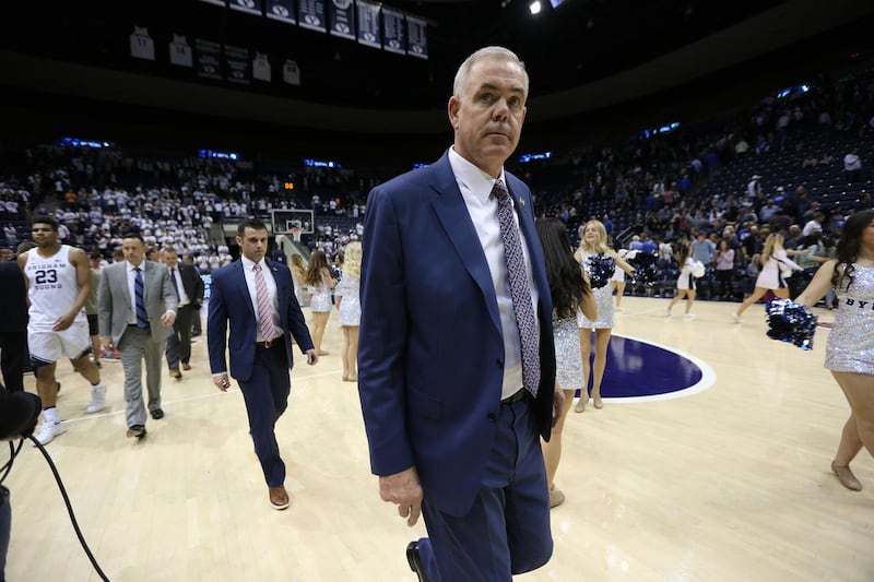 BYU head coach Dave Rose and his staff exit the floor as BYU falls to the University of Texas at Arlington in NIT action at the Marriott Center in Provo Utah on Wednesday, March 15, 2017.