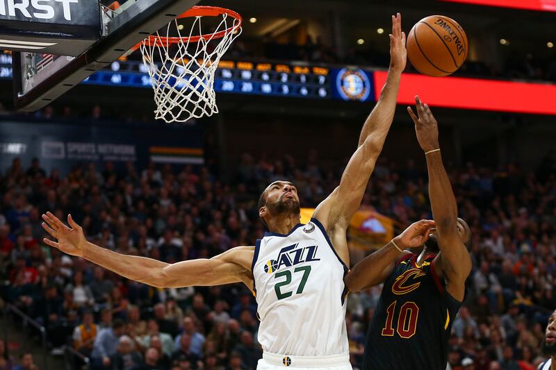 Utah Jazz center Rudy Gobert (27) blocks a shot by Cleveland Cavaliers guard Alec Burks (10) during the first half of the game at the Vivint Smart Home Arena in Salt Lake City on Friday, Jan. 18, 2019.