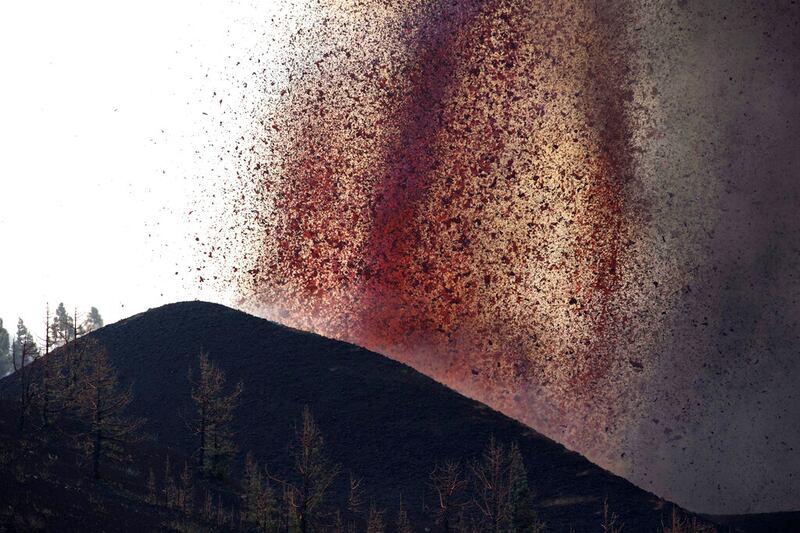 Lava flows from an eruption of a volcano near El Paso on the island of La Palma.