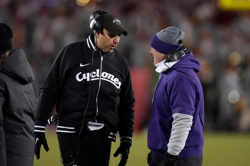 Iowa State head coach Matt Campbell, left, talks with Kansas State head coach Chris Klieman talk ahead of game, Saturday, Nov. 30, 2024, in Ames, Iowa.
