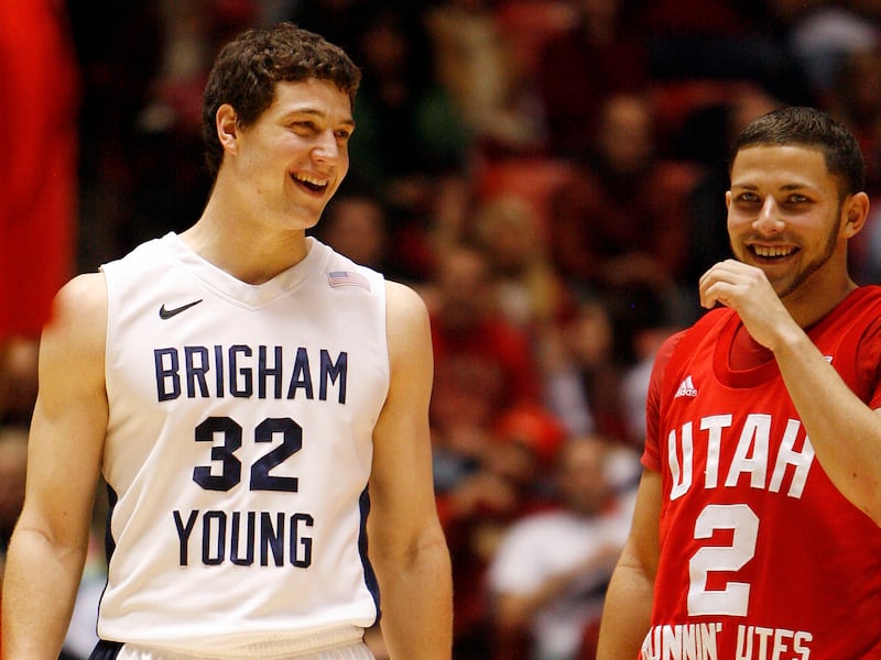 Jimmer Fredette, left, shares a laugh with Utah’s Chris Kupets in Salt Lake City, Utah on Tuesday, Jan. 11, 2011.