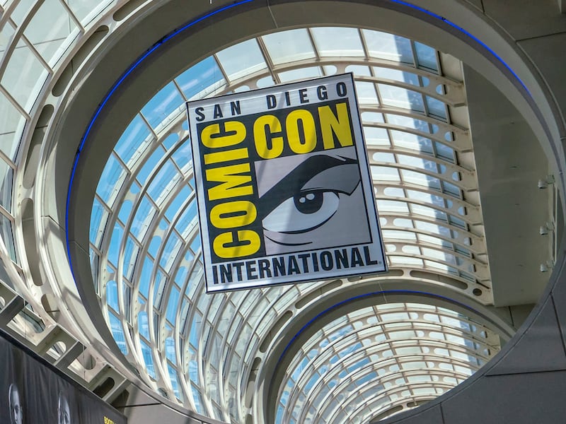 FILE - This July 20, 2018 file photo shows signage for Comic-Con International in San Diego. This year’s San Diego Comic-Con has been canceled due to coronavirus-related restrictions around large gatherings. Organizers say they are planning for the festival to return in July 2021. (Photo by Christy Radecic/Invision/AP, File)