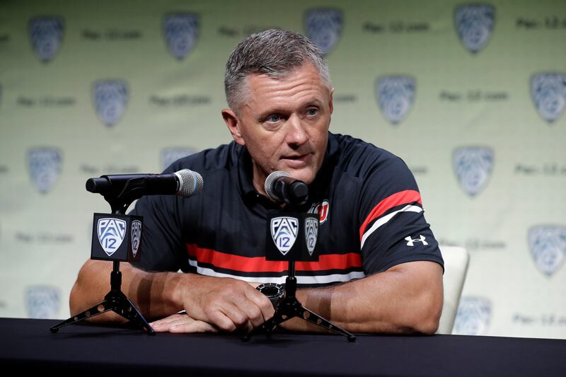 Utah head coach Kyle Whittingham answers questions during the Pac-12 Conference NCAA college football Media Day Wednesday, July 24, 2019, in Los Angeles. (AP Photo/Marcio Jose Sanchez)