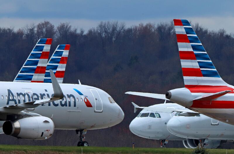 In this Tuesday, March 31, 2020, file photo, these are some of the 88 American Airlines planes stored at Pittsburgh International Airport in Imperial, Pa.