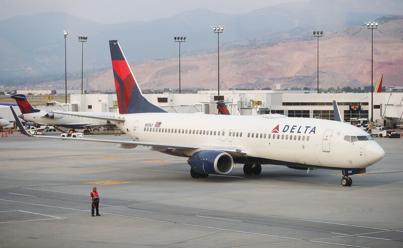An airplane taxis at Salt Lake City International Airport in Salt Lake City.