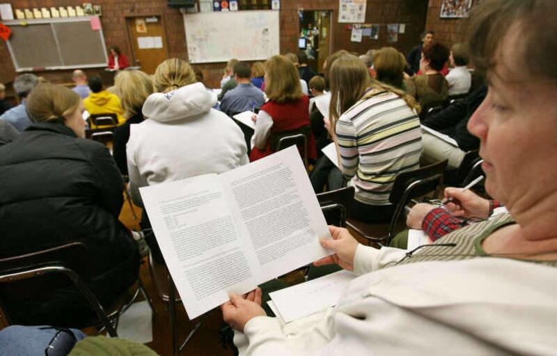 In this 2006 file photo, parents of Timpview High students attend a community council meeting. Information about school community councils and council elections is too often unclear and unavailable to the public, according to a Legislative audit released