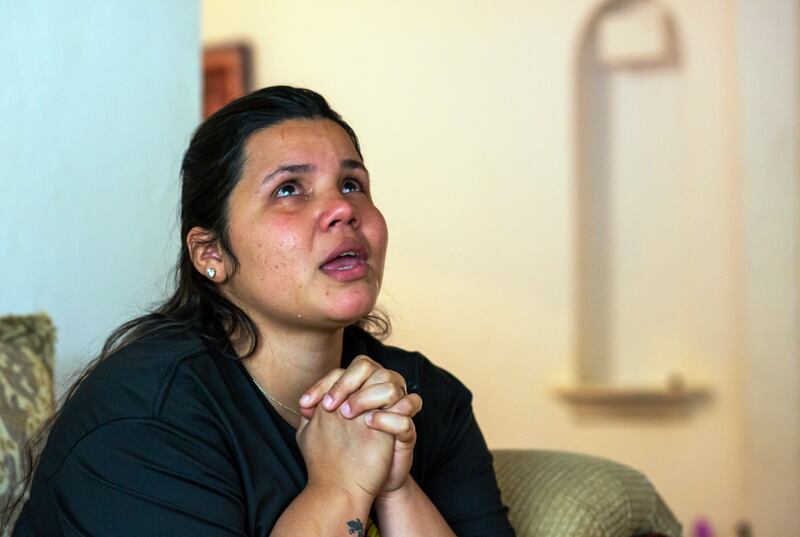 Venezuelan asylum-seeker Oriana Marcano, 29, cries and gives thanks to God for keeping her family safe during the crossing of Panama’s Darien Gap.