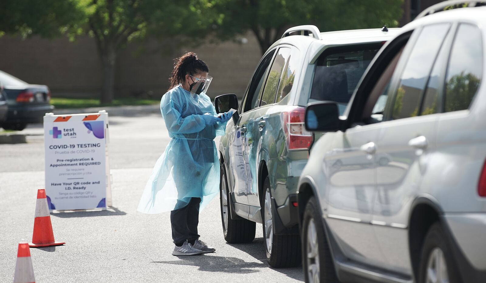 COVID-19 testing is performed at the Mount Olympus Senior Center parking lot in Millcreek, Utah.
