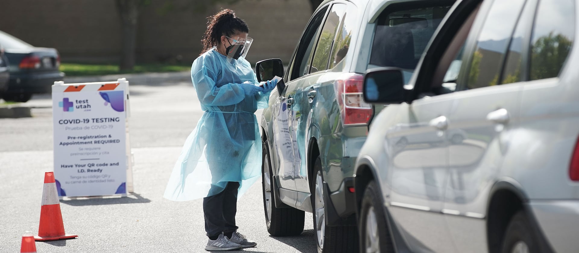 COVID-19 testing is performed at the Mount Olympus Senior Center parking lot in Millcreek, Utah.