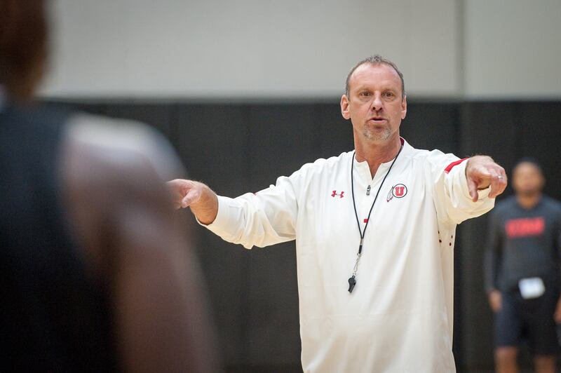 Utah basketball coach Larry Krystkowiak gives his team some instruction during media day for the Running Utes at the University of Utah in Salt Lake City Friday, Sept. 29, 2017.