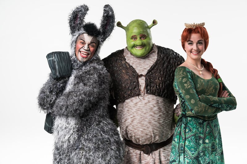 AndrÉ Jordan is Donkey, left, Steve Judkins is Shrek and Whitney Winfield ais Fiona in Tuacahn's production of "Shrek: The Musical."