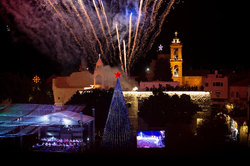 Fireworks light the sky over the Church of the Nativity in Bethlehem on Dec. 4.