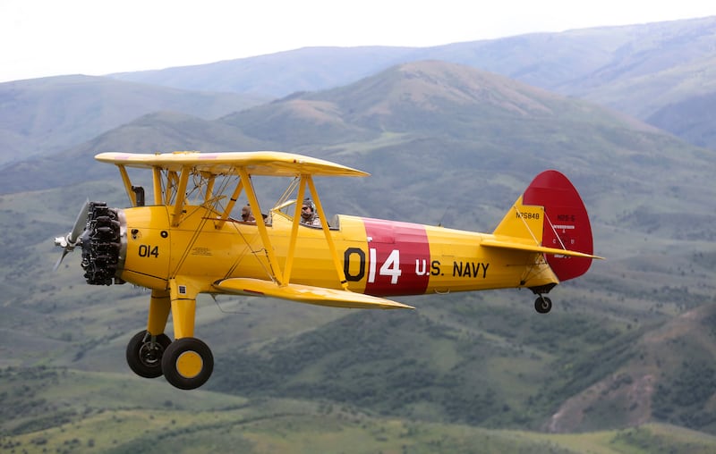 Doug Compton takes retired Air Force Lt. Col. Bill Willis, 97, for a ride in a Boeing-Stearman from the Morgan County Airport in Morgan on Friday, June 14, 2019.