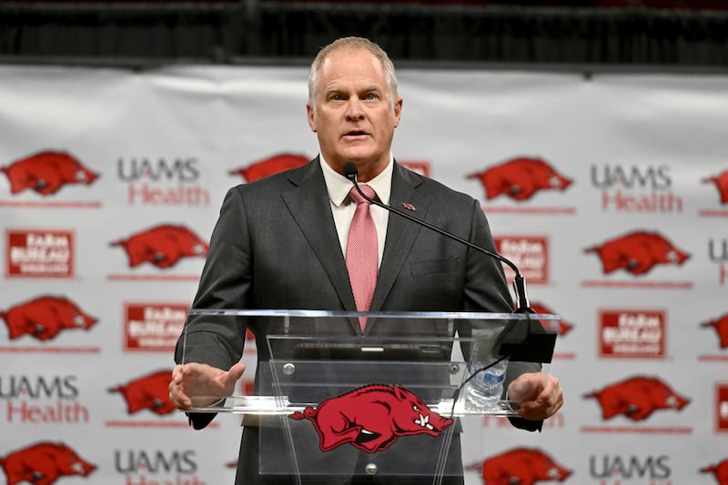 Hunter Yurachek, Arkansas vice chancellor and director of athletics, speaks during a news conference, Wednesday, April 10, 2024, in Fayetteville, Ark.