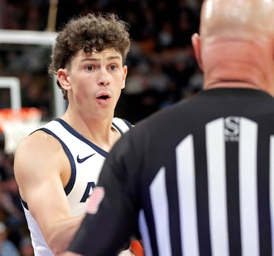 Utah State guard Drake Allen presents his case to an official during the Aggies' 95-83 win over Montana on Nov. 18 at the Spectrum in Logan.
