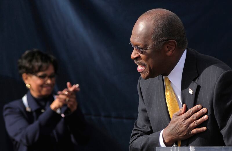 Republican presidential candidate Herman Cain delivers an announcement Saturday, Dec. 3, 2011, at a campaign event in Atlanta.