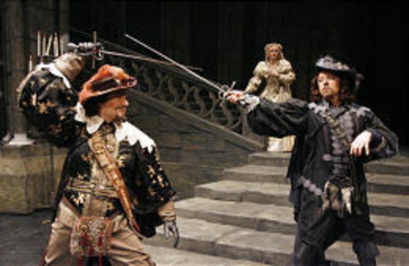 Michael Chioldi, left, Sarah Cobrun and Robert Breault star in "Lucia di Lammermoor."